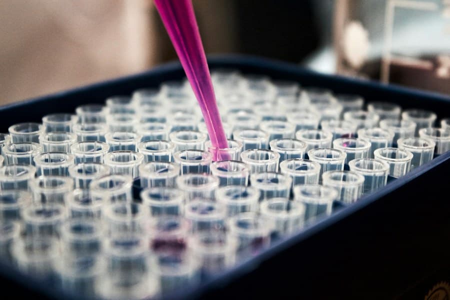 Illustrative photograph of a pipette and laboratory sample wells